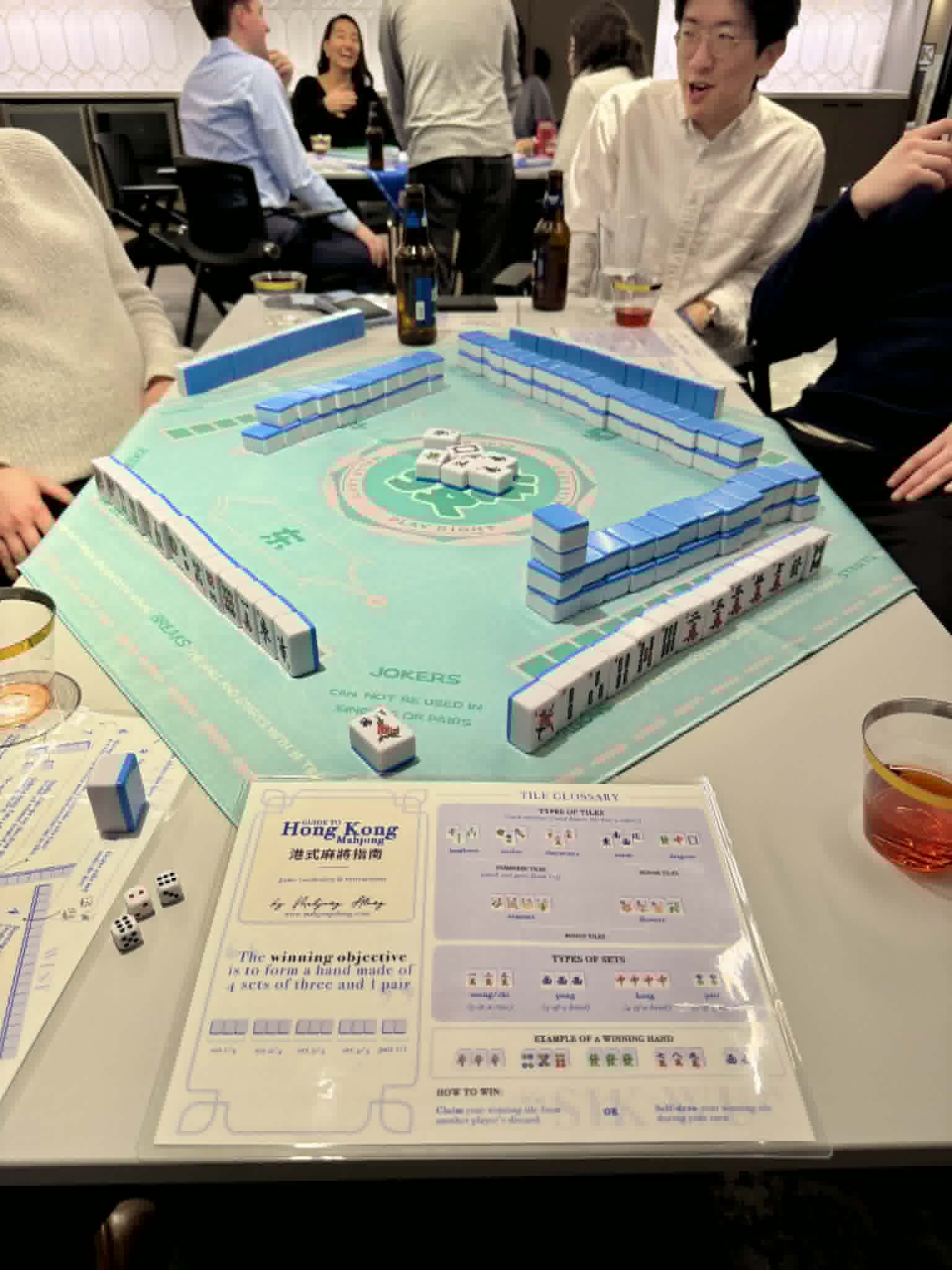 People playing mahjong at a Mahjong Along event